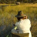 0_A-woman-photographs-elephants-while-canoeing-on-the-Selinda-Spillway.jpg