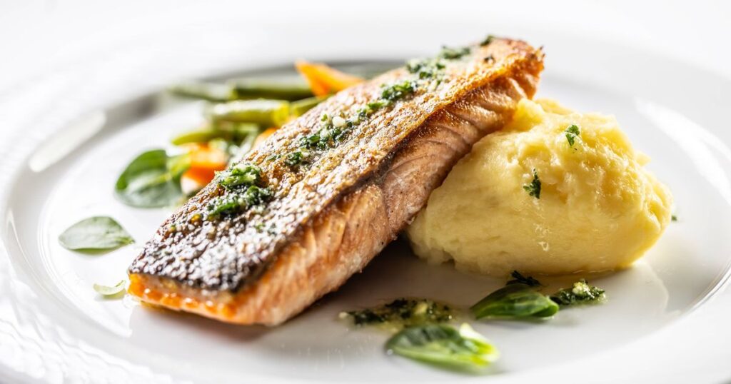 0_Baked-salmon-fillet-with-mashed-potatoes-and-English-vegetables-on-a-white-isolated-background.jpg