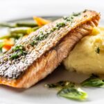0_Baked-salmon-fillet-with-mashed-potatoes-and-English-vegetables-on-a-white-isolated-background.jpg