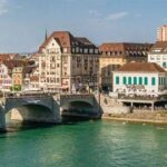 0_Close-up-aerial-view-of-the-quays-of-the-river-Rhine-in-the-city-center-of-Basel-with-a-view-on-pe.jpeg