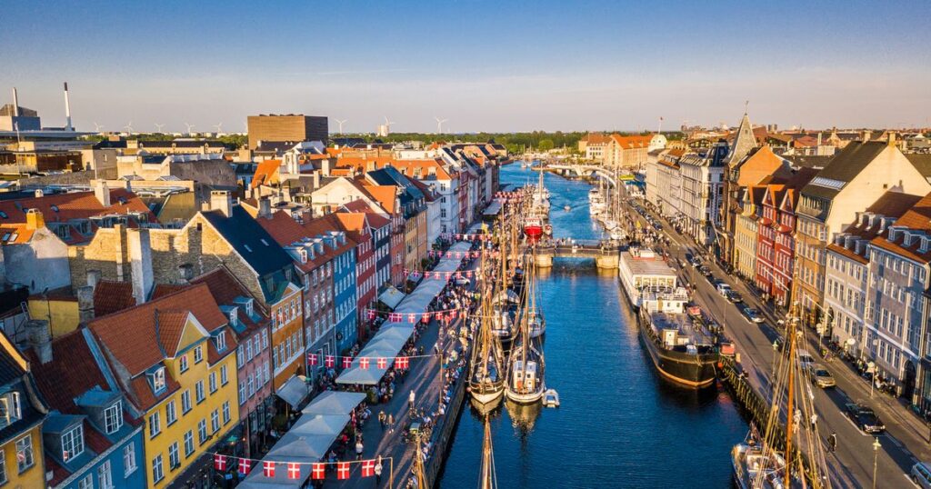 0_Copenhagen-Denmark-New-Harbour-canal-and-entertainment-famouse-street-Aerial-shoot-view-from-the.j.jpeg