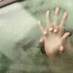 0_Couple-holding-hands-having-sex-inside-a-car.jpg