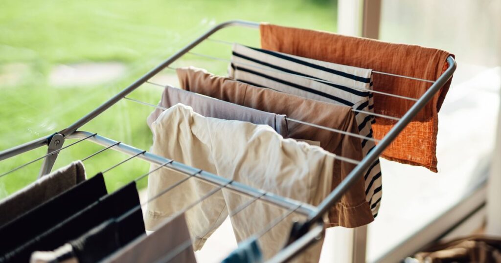0_Drying-laundry-on-drying-rack-by-the-window-with-sunlight.jpg