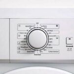 0_Front-view-of-the-control-panel-and-drum-conteiner-of-a-modern-washing-machine-white-color.jpg