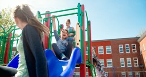0_Group-of-kids-active-in-school-playground-at-recess.jpg