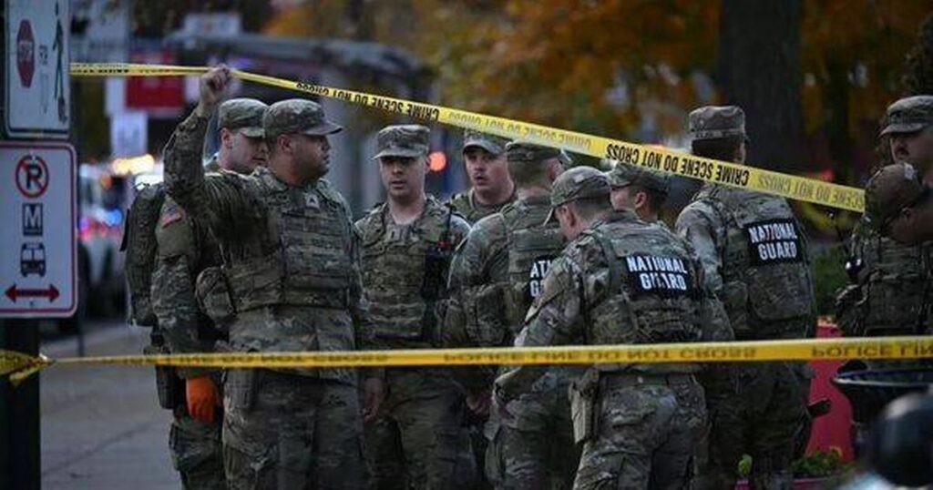 0_National-Guard-soldiers-stand-behind-the-crime-scene-in-Washington-DC.jpg