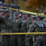 0_National-Guard-soldiers-stand-behind-the-crime-scene-in-Washington-DC.jpg