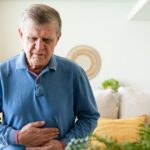 0_Senior-man-suffering-stomach-pain-at-home.jpg