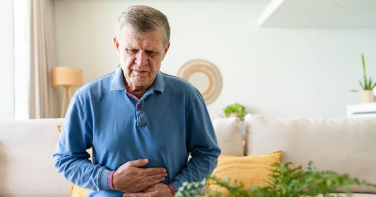 0_Senior-man-suffering-stomach-pain-at-home.jpg