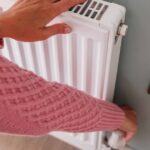 0_Womans-hands-adjusting-a-heating-temperature-on-a-radiator-at-home.jpg