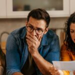 0_Worried-family-reading-bad-news-on-bills-at-home.jpg
