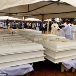 103892237-15291917-Coffins_of_17_worshippers_and_two_priests_who_were_allegedly_kil-a-6_176330659690.avif