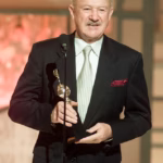 104188861-15326485-Hackman_seen_accepting_the_Cecil_B_DeMille_award_on_stage_at_the-a-44_17641184258.avif