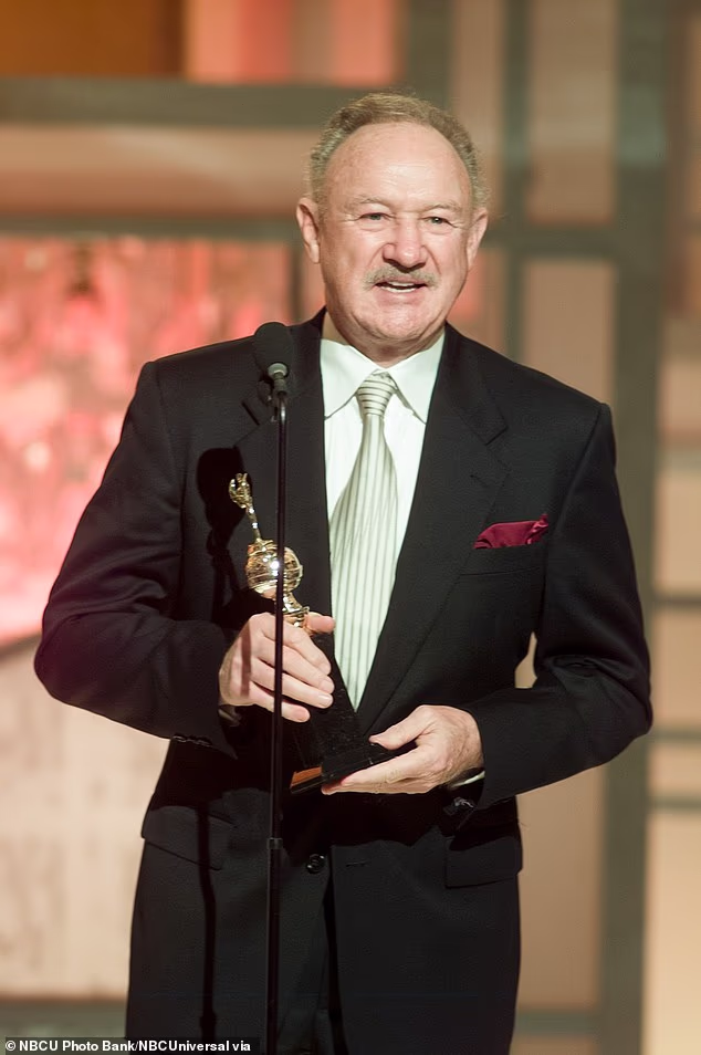 104188861-15326485-Hackman_seen_accepting_the_Cecil_B_DeMille_award_on_stage_at_the-a-44_17641184258.avif