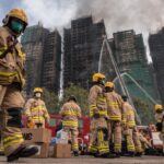 1764234124_0_TOPSHOT-HONG-KONG-CHINA-FIRE.jpg