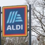1_Aldi-logo-and-timetable-sign-at-the-entrance-to-the-budget-friendly-supermarket-Ampthill-Road-Flit.jpeg