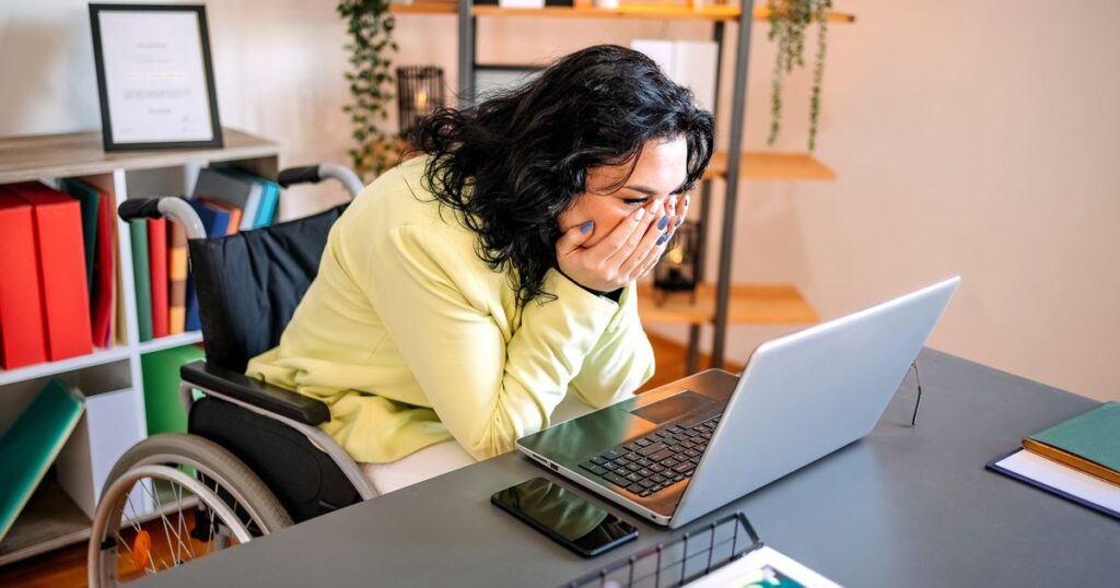 1_Disabled-person-shocked-at-their-laptop.jpg