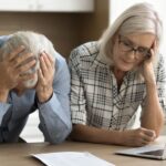 1_Elderly-couple-upset-looking-at-their-finances.jpg