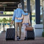 1_Senior-couple-walking-together-on-public-transport-station.jpg
