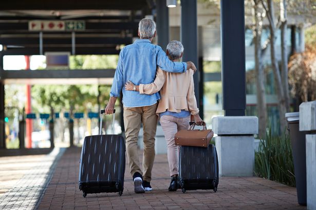 1_Senior-couple-walking-together-on-public-transport-station.jpg