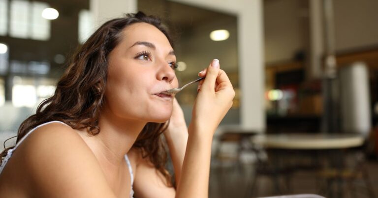 1_Woman-using-spoon-in-a-coffee-shop.jpg