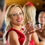 3_Smiling-woman-toasting-with-her-friend-in-a-bar.jpg