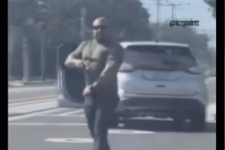 California-cop-tried-to-stop-a-man-pointing-a-gun-at-a-female-driver-It-was-a-plainclothes-ICE-agen.avif