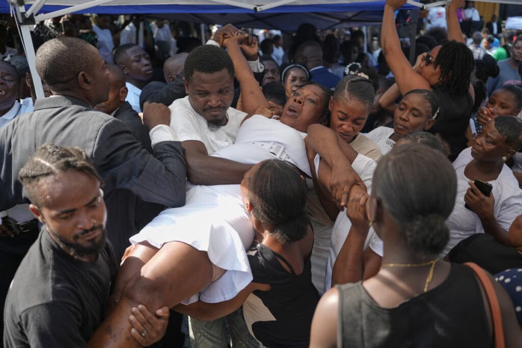 Haiti_Extreme_Weather_Funeral_85634.jpg