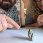 Prof.20Leore20Grosman20and20Dr.20Laurent20Davin20with20the20figurine20-Hadas20Goldgeier.webp