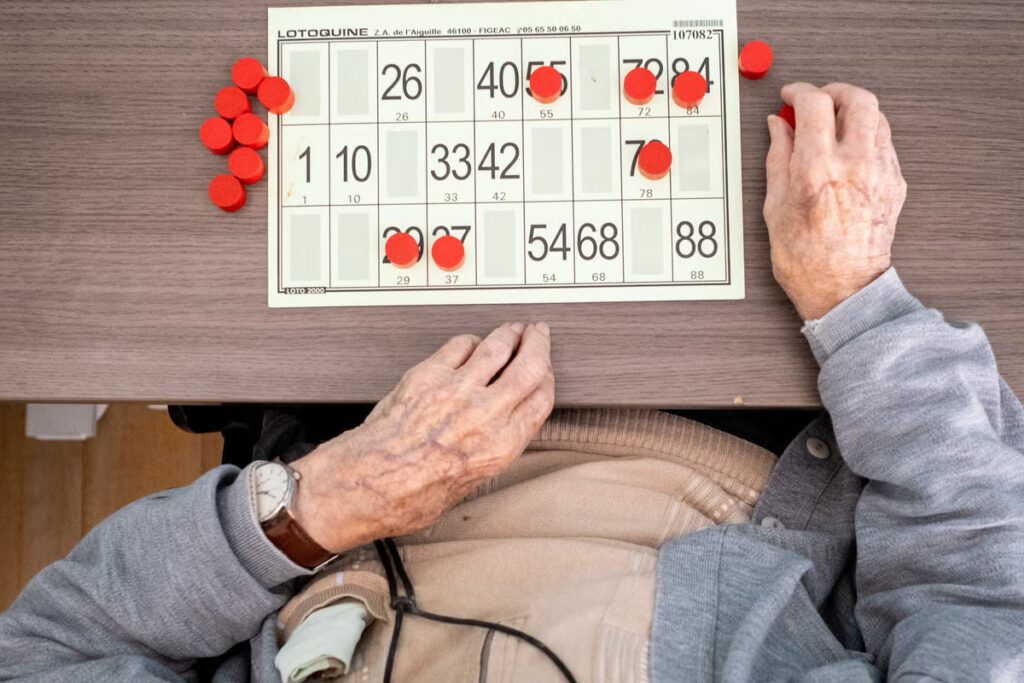 Resident-participates-in-the-bingo-game-in-Kerloudan-Retirement-residential-nursing-care-home.jpeg