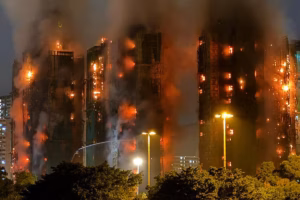 Thick-smoke-and-flames-rise-as-a-major-fire-engulfs-several-apartment-blocks-at-the-Wang-Fuk-Court-r.avif
