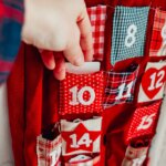 advent-calendar-preparing-christmas-hand-1040558979.jpg