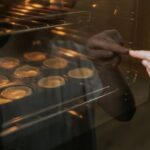 0_A-little-girl-watches-Yorkshire-Puddings-rise-in-an-oven.jpg