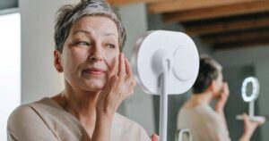 0_A-mature-woman-applying-skincare.jpg
