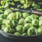 0_Bowl-with-raw-Brussels-sprouts-on-dark-rustic-table-with-ingredients.jpg
