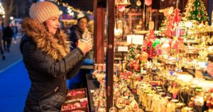 0_Choosing-a-gift-at-a-Christmas-market-stall.jpg