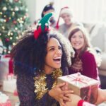 0_Enthusiastic-friends-exchanging-Christmas-gifts.jpg