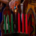 0_Kwanzaa-celebration-close-up-of-family-lighting-the-kinara-candle-in-spirit-of-unity.jpg