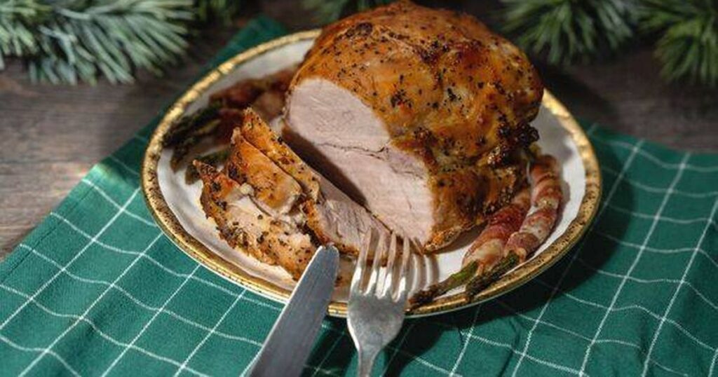0_Roasted-pork-meat-on-a-Christmas-table-with-a-piece-cut-off.jpg