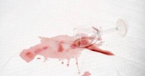 0_Spilled-red-wine-on-white-tablecloth.jpg