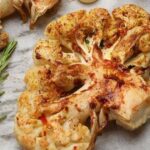 0_Tasty-cauliflower-steaks-rosemary-and-garlic-on-table-closeup.jpg