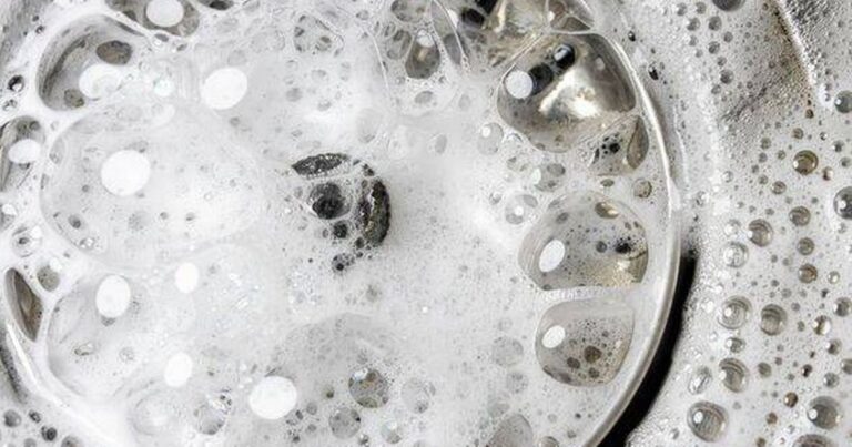 0_White-foam-with-bubbles-of-cleaner-in-a-washbasin-macro-view-Drain-hole-with-soap-bubbles-in-metal.jpeg