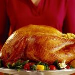 0_Woman-with-roast-turkey.jpg
