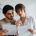 0_Worried-Couple-Paying-Bills-at-Home.jpg
