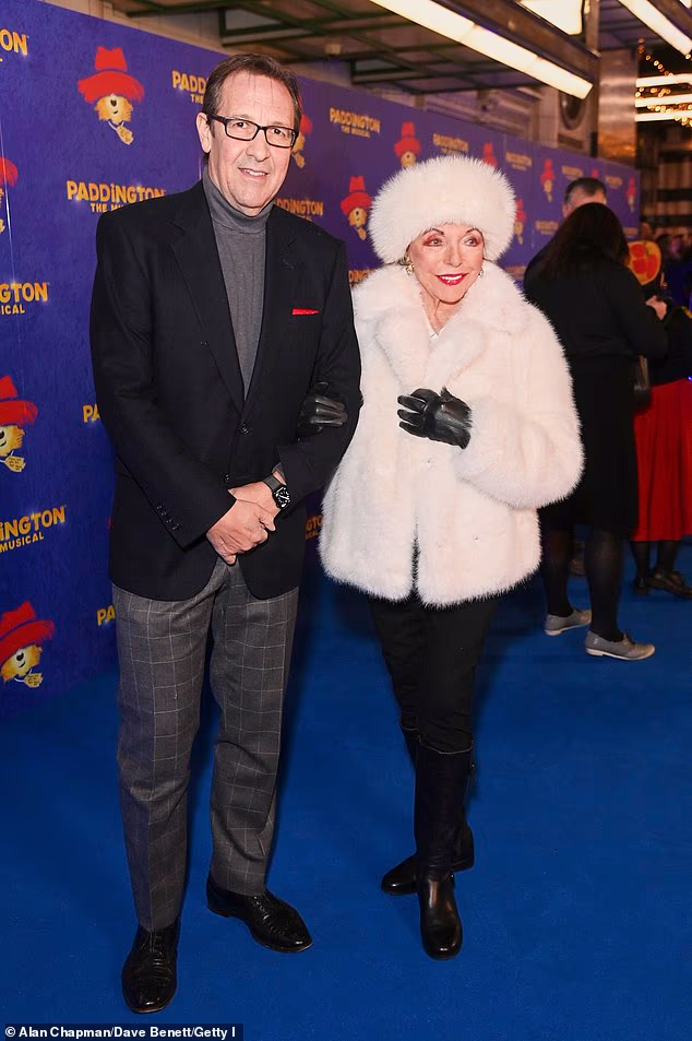 104318091-15340153-Dame_Joan_Collins_made_a_glamorous_entrance_alongside_her_husban-a-31_17645406109.avif