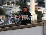 104711487-0-Naveed_Akram_24_armed_with_a_rifle_at_Bondi_Beach-a-3_1765740146184.jpg