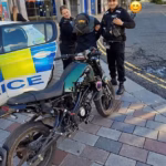 104810787-15392263-Police_apprehend_a_masked_e_bike_rider_racing_through_the_street-a-3_176610984373.avif