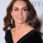 104838915-15323861-Kate_43_was_resplendent_as_she_returned_to_the_red_carpet_after_-a-30_17661772850.avif