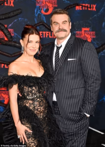 104866821-15397981-Millie_Bobby_Brown_21_and_David_Harbour_50_were_noticeably_absen-a-56_17661159997.avif