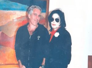 104892955-15400815-Epstein_seen_with_Michael_Jackson_in_an_undated_photograph-a-78_1766181377696.jpg